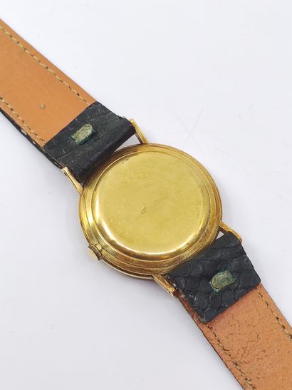 MOVADO 

Wristwatch, round case in yellow...