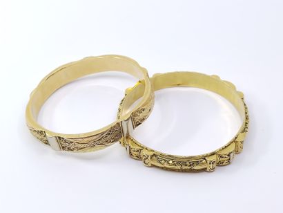 Foreign work

TWO bracelets in yellow gold...