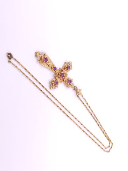 CHAIN in yellow gold 750° with a cross decorated...