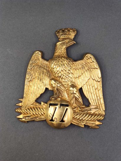 
Shako plate of the 77th of the line. 




In...