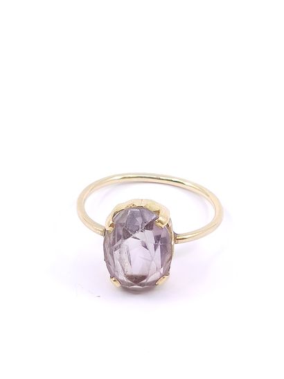 14kt yellow gold ring with a quartz 

Gross...