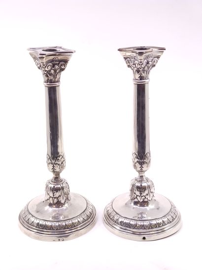 PAIR of silver candlesticks with Corinthian...