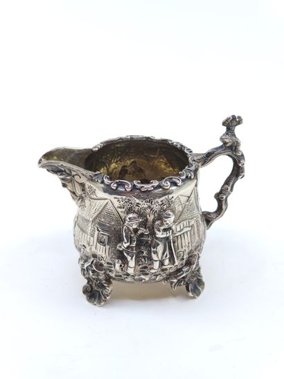 English silver tea service decorated with...