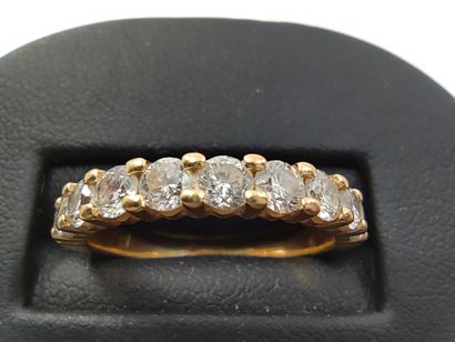 HALF-ALLIANCE in yellow gold 750° decorated...