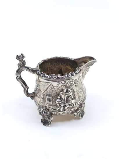 English silver tea service decorated with...