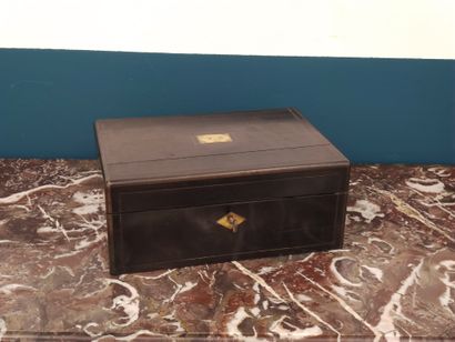 TRAVEL NECESSARY in a blackened wood box...