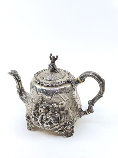 English silver tea service decorated with...