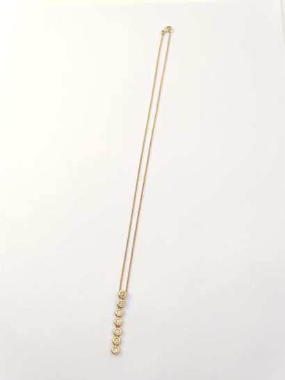 SET comprising : 

Chain in yellow gold 750°...