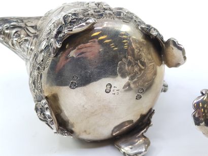 English silver tea service decorated with...
