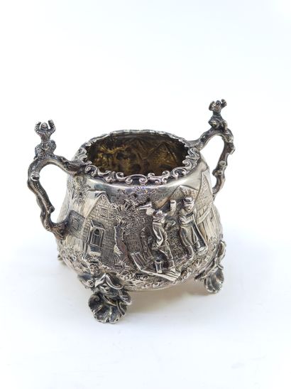 English silver tea service decorated with...