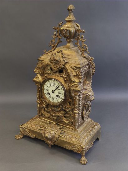 Gilt bronze clock in the Louis XV style decorated...