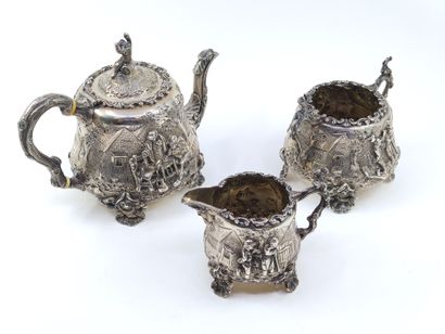 English silver tea service decorated with...
