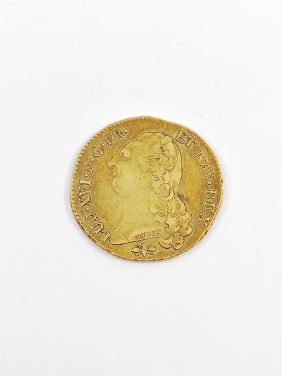 PIECE in yellow gold representing Louis XVI...