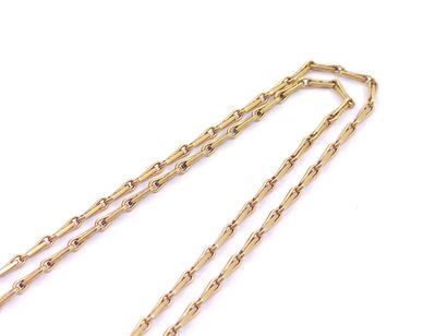 CHAIN in yellow gold 750° with a cross decorated...