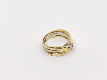 RING in two-tone 750° gold set with a line...