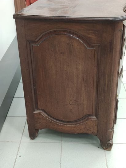 
Crossbow chest of drawers in walnut molded...
