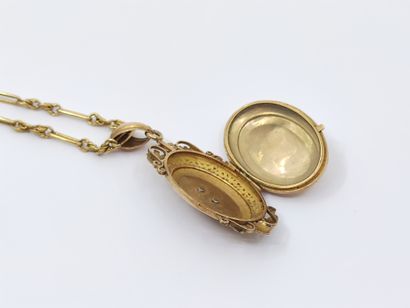 750° yellow gold CHAIN with a pendant decorated...