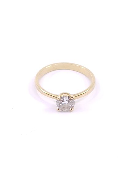 Yellow gold ring 750 decorated with a solitaire...
