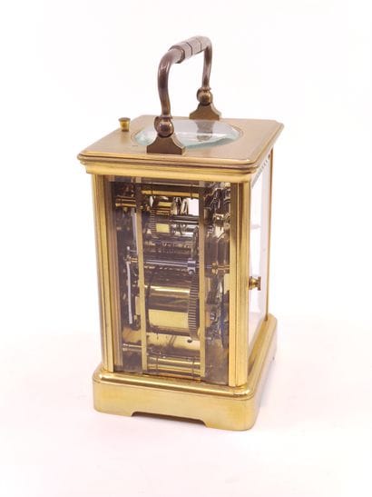 Officer's clock with brass cage

Cream enameled...