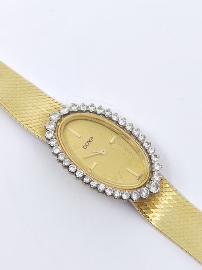 DOXA

Ladies' wristwatch in yellow gold 750°,...