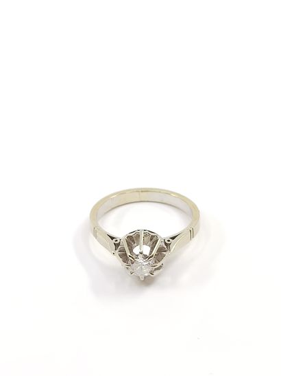 Solitaire ring in grey 750° set with a diamond...