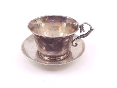 THREE silver cups with dragon handles 

One...