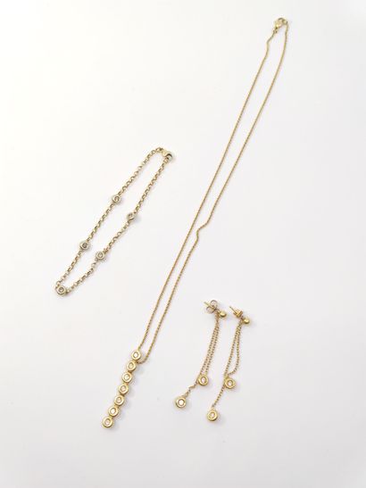 SET comprising : 

Chain in yellow gold 750°...