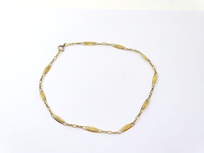 Chain in yellow gold 750° oval mesh 

weight...