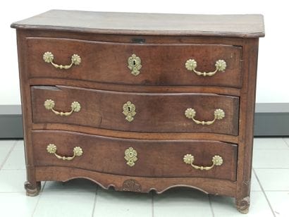 
Crossbow chest of drawers in walnut molded...