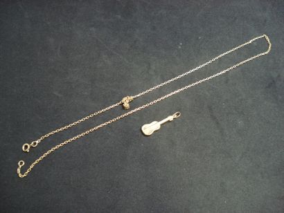 1 Pendentif Or 18kt 0,86 g 1 Chaine Or 18kt...