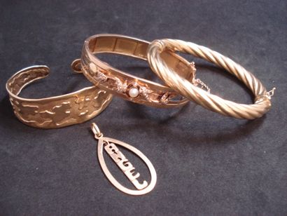 2 open rigid bracelets 18kt gold 40,75 g...