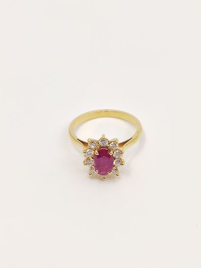 BAGUE marguerite en or jaune 750° ornée d'un...
