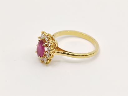BAGUE marguerite en or jaune 750° ornée d'un...