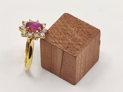 BAGUE marguerite en or jaune 750° ornée d'un...