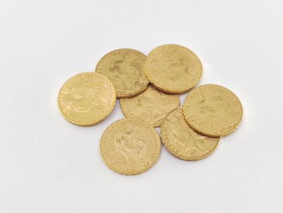 
LOT de sept pièces de 20 francs or au coq




1900,...