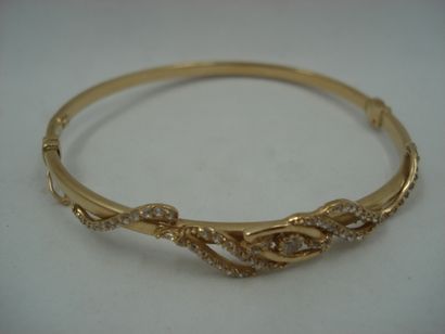 1 Rigid opening bracelet 18kt yellow gold...