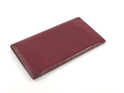 HERMES

Porte-carte en cuir bordeaux

Dans...