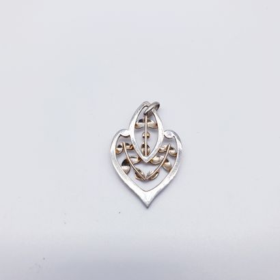 PENDENTIF en or gris 750° en forme de feuille...