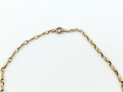 
COLLIER en or jaune 750° et gris se composant...