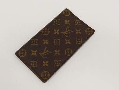 
LOUIS VUITTON 




Portefeuille en toile...