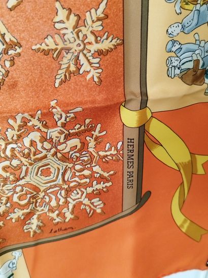 HERMES

Foulard de couleur orange à décor...