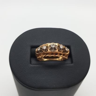 
BAGUE jarretière en or 750° ornée de cinq...