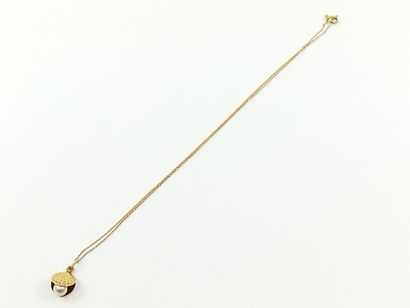 750° yellow gold CHAIN with a pendant adorned...