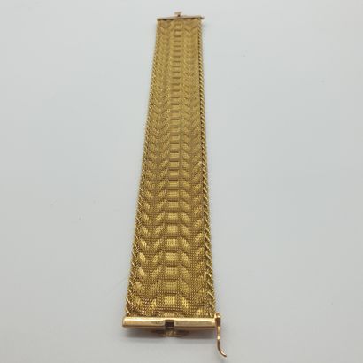 BRACELET en or jaune 750°, maille tressée...