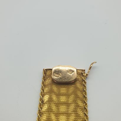 BRACELET en or jaune 750°, maille tressée...