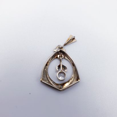 White gold pendant 750° decorated with white...