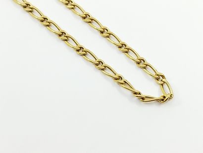 Chain in yellow gold 750° with curb chain...