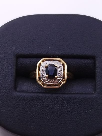 
BAGUE en or jaune et gris 750° ornée d'un...