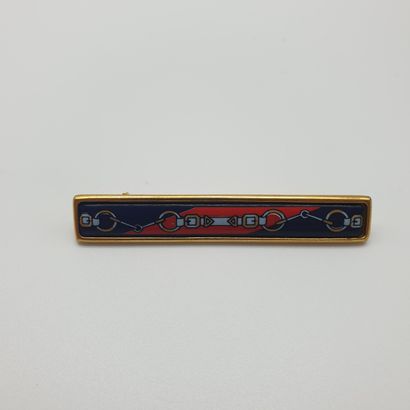 HERMES

BROCHE en métal doré émaillée, à...