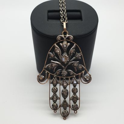 
PENDENTIF en or jaune 750° et argent représentant...